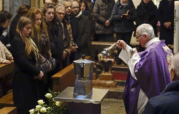 Ashes of Italian coffee tycoon placed in a huge coffee pot at his funeral