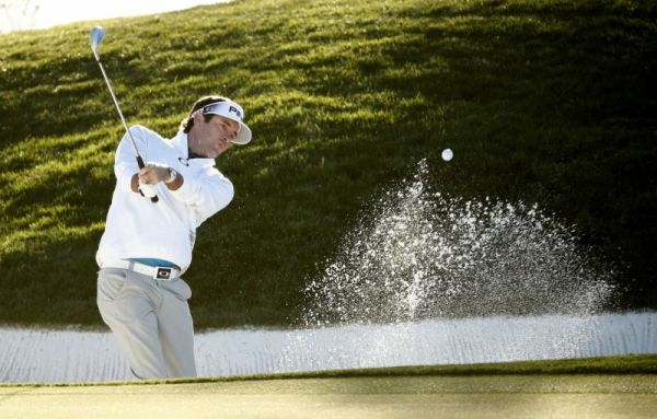 Bubba Watson hits out of a bunker