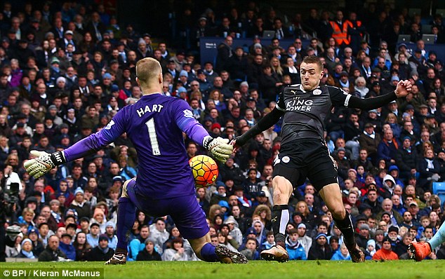 Jamie Vardy has a shot saved by Joe Hart during Leicester's 3-1 win against Manchester City on Saturday