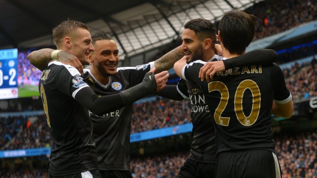 Jamie Vardy left has signed a new contract with the Foxes