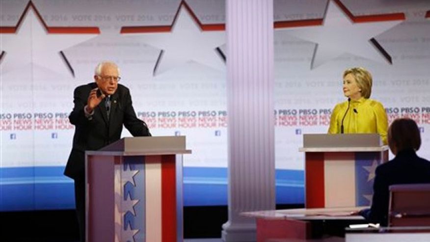 Democratic presidential candidate Sen. Bernie Sanders I-Vt left speaks as Hillary Rodham Clinton listens during a Democratic presidential primary debate at the University of Wisconsin-Milwaukee Thursday Feb. 11 2016 in Milwaukee. (AP