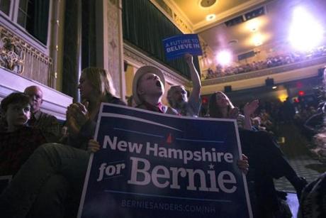 The crowd cheers Democratic presidential candidate Senator Bernie Sanders at the Colonial Theatre in Keene N.H. Feb. 2