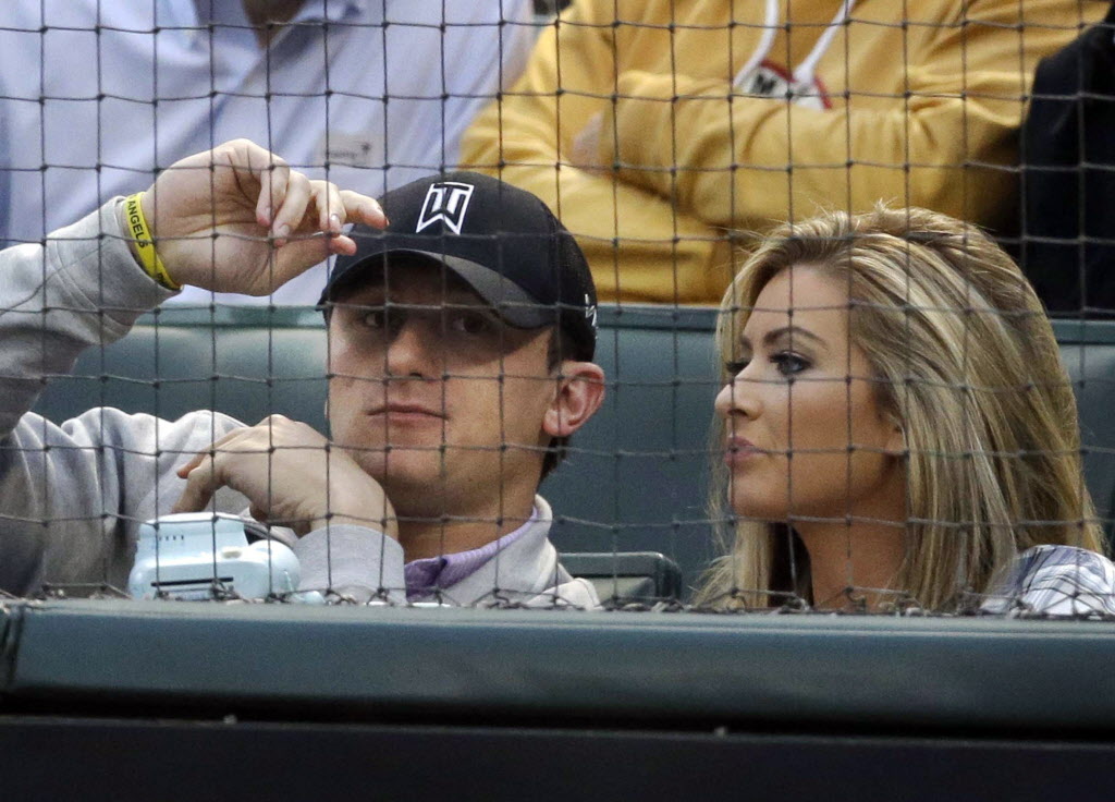 Johnny Manziel and Colleen Crowley attended a Texas Rangers game in this AP file