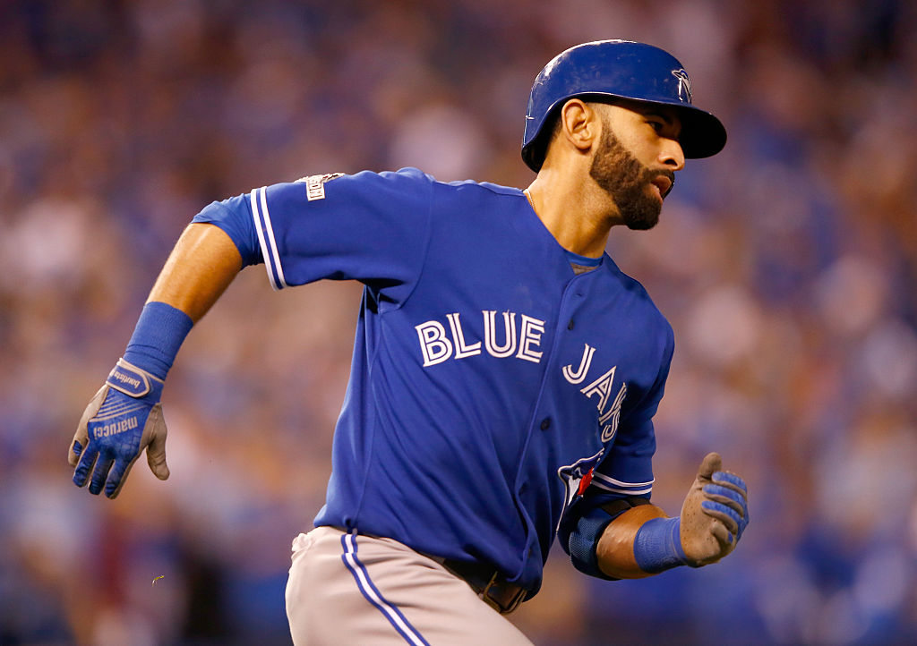 KANSAS CITY MO- OCTOBER 23 Jose Bautista #19 of the Toronto Blue Jays rounds the bases after he hits a two-run home run in the eighth inning against the Kansas City Royals in game six of the 2015 MLB American League Championship Series at Kauffman Sta