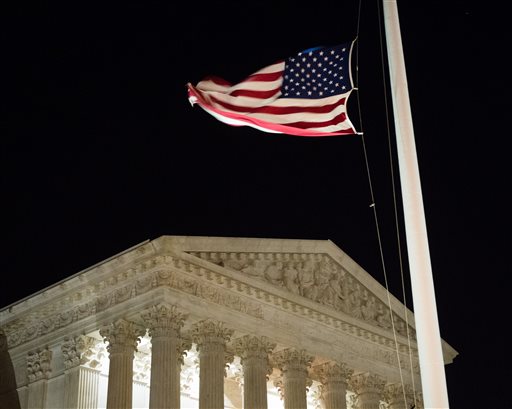 A U.S. flag flies at half-staff in front of the U.S. Supreme Court in Washington Saturday Feb. 13 2016 after is was announced that Supreme Court Justice Antonin Scalia 79 had died