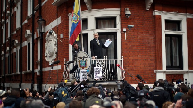 Julian Assange speaks from the balcony of the Ecuadorian embassy late last week