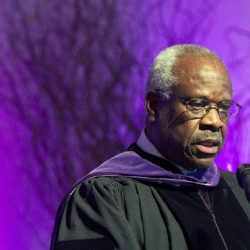 Supreme Court Justice Clarence Thomas speaks at College of the Holy Cross in Worcester Mass. Thomas has asked questions during Supreme Court arguments for the first time in 10 years. Thomas&#039 question