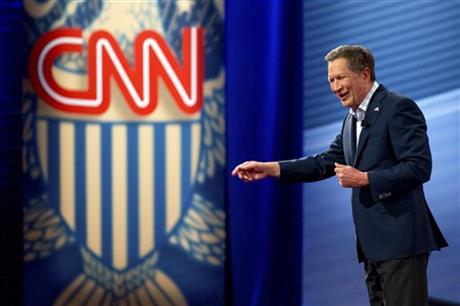 Republican presidential candidate Ohio Gov. John Kasich answers a question from a member of the audience at a CNN town hall at the University of South Carolina in Columbia S.C. Thursday Feb. 18 2016