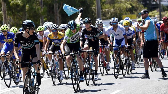 Britain’s Chris Froome of Team Sky collects his food bag during stage three of the 2016 Herald Sun Tour cycling race between Traralgon to Inverloch in Victoria