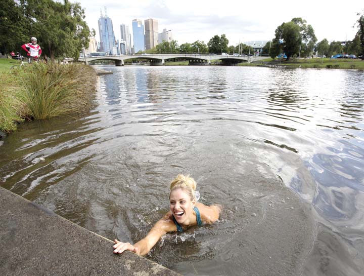 Angelique Kerber swims in the Yarra River to celebrate her breakthrough Grand Slam win in the Australian Open Saturday where she stunned world No. 1 Serena Williams 6-4 3-6 6-4