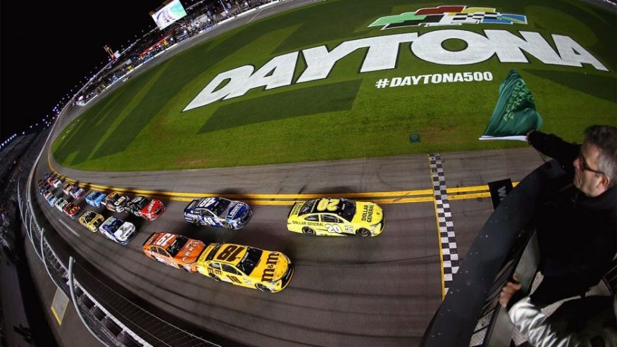 DAYTONA BEACH FL- FEBRUARY 18 Matt Kenseth driver of the #20 Dollar General Toyota leads the field to the green flag to start the NASCAR Sprint Cup Series Can Am Duels at Daytona International Speedway