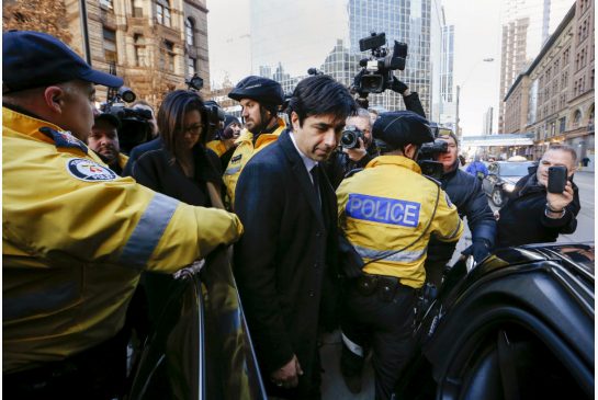 Jian Ghomeshi leaves the courthouse after the first day of his trial on Monday