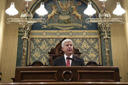 Michigan Gov. Rick Snyder delivers his State of the State address to a joint session of the House and Senate Jan. 19 2016 at the state Capitol in Lansing Mich