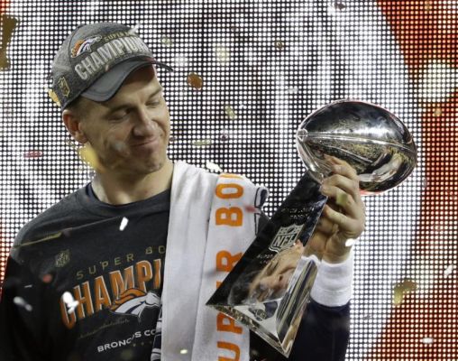 Denver Broncos Peyton Manning holds up the