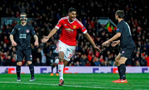 Marcus Rashford celebrates scoring the second goal for Manchester United