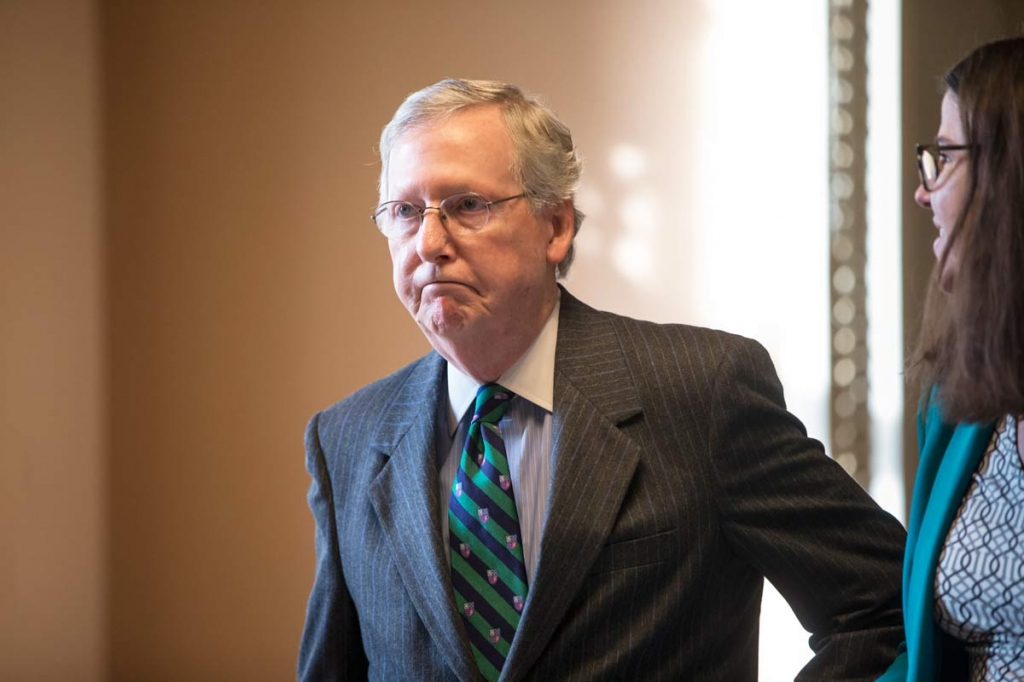 Senate Majority Leader Mitch Mc Connell walks to his office from the chamber where he offered a tribute to the late Supreme Court Justice Antonin Scalia whose death has triggered an election-year political standoff on Capitol Hill in Washington Monday F