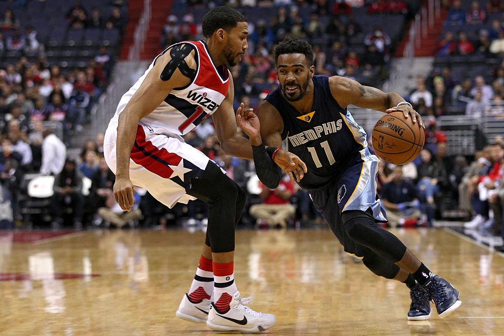 Memphis Grizzlies point guard Mike Conley drives against Washington Wizards&#039 Garrett Temple