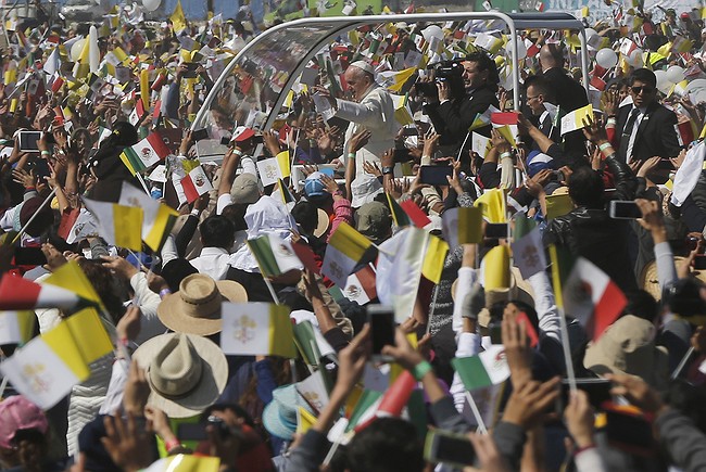 The Latest: Pope greets faithful on 1st full day in Mexico