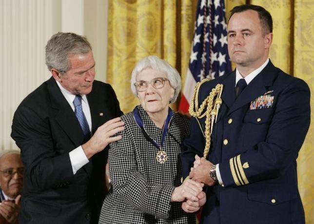 U.S. President George W. Bush awards the Presidential Medal of Freedom to American novelist Harper Lee in the East Room of the White House