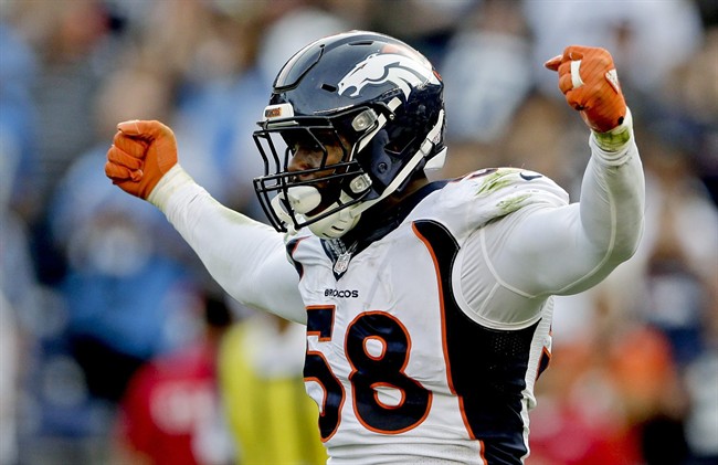 Denver Broncos outside linebacker Von Miller celebrates a sack against the San Diego Chargers during the second half of an NFL football game in San Diego. The NFL's salary cap for 2016 will be $155.27 milli