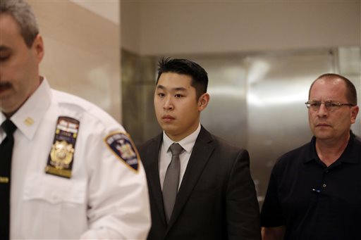 New York City rookie police officer Peter Liang arrives at court in New York for arraignment. Opening statements are expected Monday Jan. 25 2016 in Liangs manslaughter trial for the 2014 death of Akai Gurley