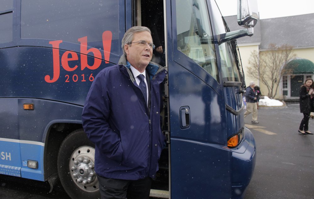 Republican presidential candidate former Florida Gov. Jeb Bush steps off his bus as he arrives at a campaign event Monda in Nashua N.H