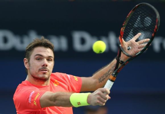 Stan Wawrinka from Switzerland returns the ball