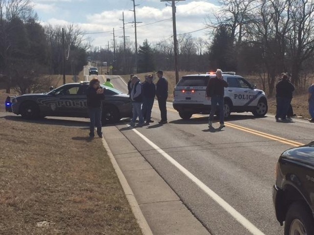 Officials outside of Madison Junior and Senior High School