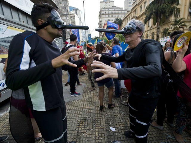 S Brazilians Disguised as Zika Mosquitoes Storm Opening Day of Carnival AFP by Frances Martel5 Feb 20160 5 Feb 2016 5 Feb 2016