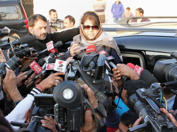 PDP president Mehbooba Mufti addresses the media outside Raj Bhawan after meeting Governor N.N. Vohra in Jammu on Tuesday