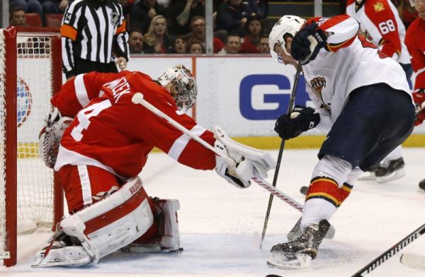 Detroit Red Wings goalie Petr Mrazek stops