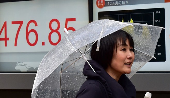 The Bank of Japan implements negative interest rates in its first benchmark move in over five years