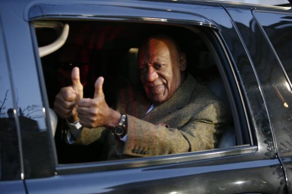 508046192-comedian-bill-cosby-gives-a-thumbs-up-as-he-leaves-the