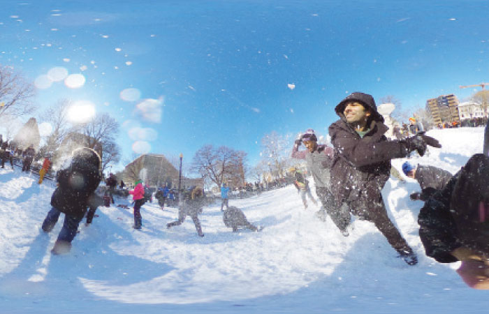 People participate in a snowball fight at Dupont Circle in Washington D.C. on Sunday. — AFP