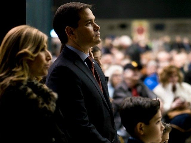 WASHINGTON DC- February 1 Senator and Presidential candidate Marco Rubio stands with his family as he waits to address voters at a caucus site as Iowans prepare to cast their first votes in the 2016 Presidential primaries