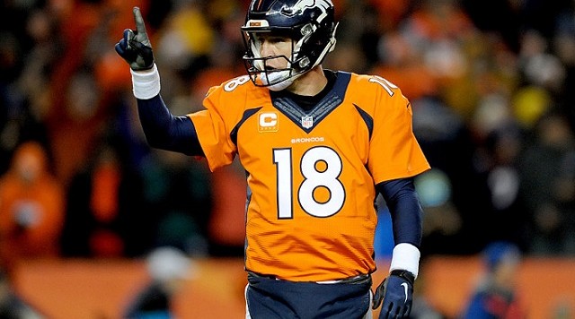 DENVER CO- JANUARY 17 Peyton Manning #18 of the Denver Broncos signals to the sideline during the AFC Divisional Playoff Game against the Pittsburgh Steelers at Sports Authority Field at Mile High