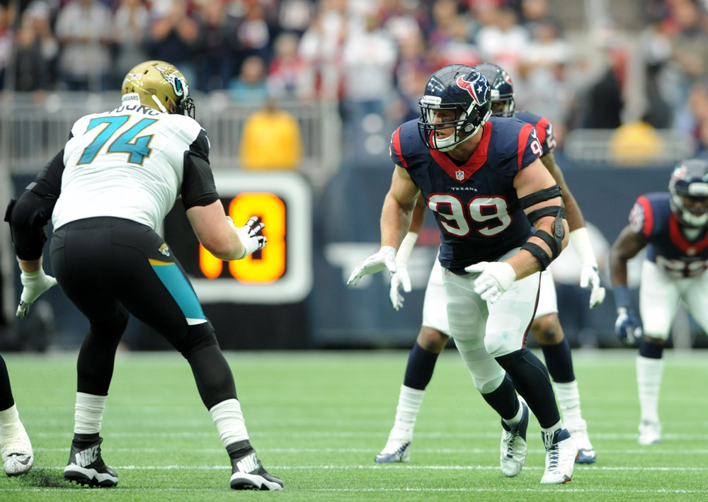 03 January 2016 Texans DE J. J. Watt is blocked by Sam Young during 30- 6 win over the Jaguars at NRG Stadium in Houston TX