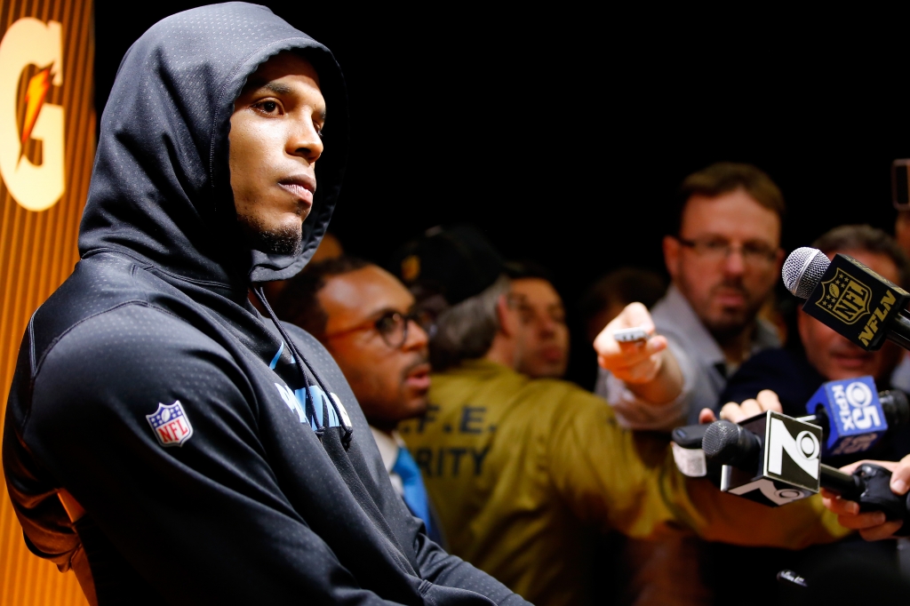 SANTA CLARA CA- FEBRUARY 07 Cam Newton #1 of the Carolina Panthers reacts during his postgame press conference after the Denver Broncos defeated the Carolina Panthers with a score of 24 to 10 to win Super Bowl 50 at Levi's Stadium