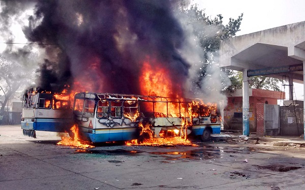 20 2016 shows vehicles being set on fire during a protest in Haryana India