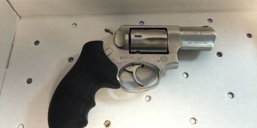 Police recovered a.357 Magnum revolver from the front seat of Jamal Funes’ car after a gunfight that left two officers injured