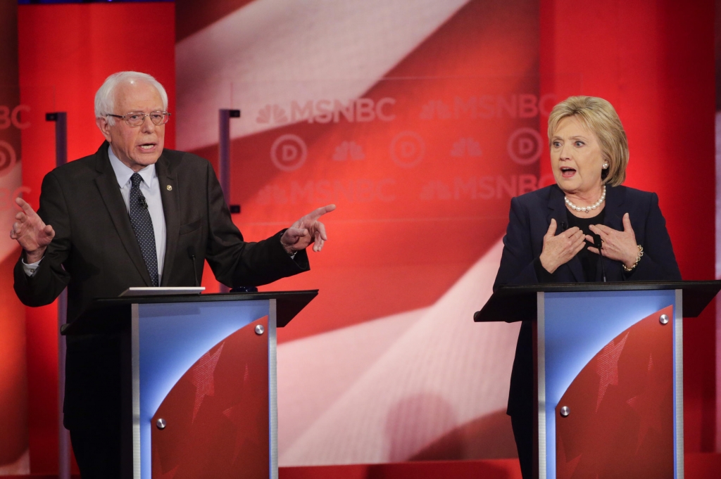 Sen. Bernie Sanders and former Secretary of State Hillary Clinton spar during a Democratic presidential primary debate hosted by MSNBC at the University of New Hampshire on Thursday