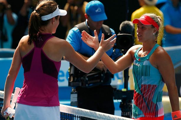 REUTERS  Thomas Peter
German power Jo Konta shakes hands with Angelique Kerber