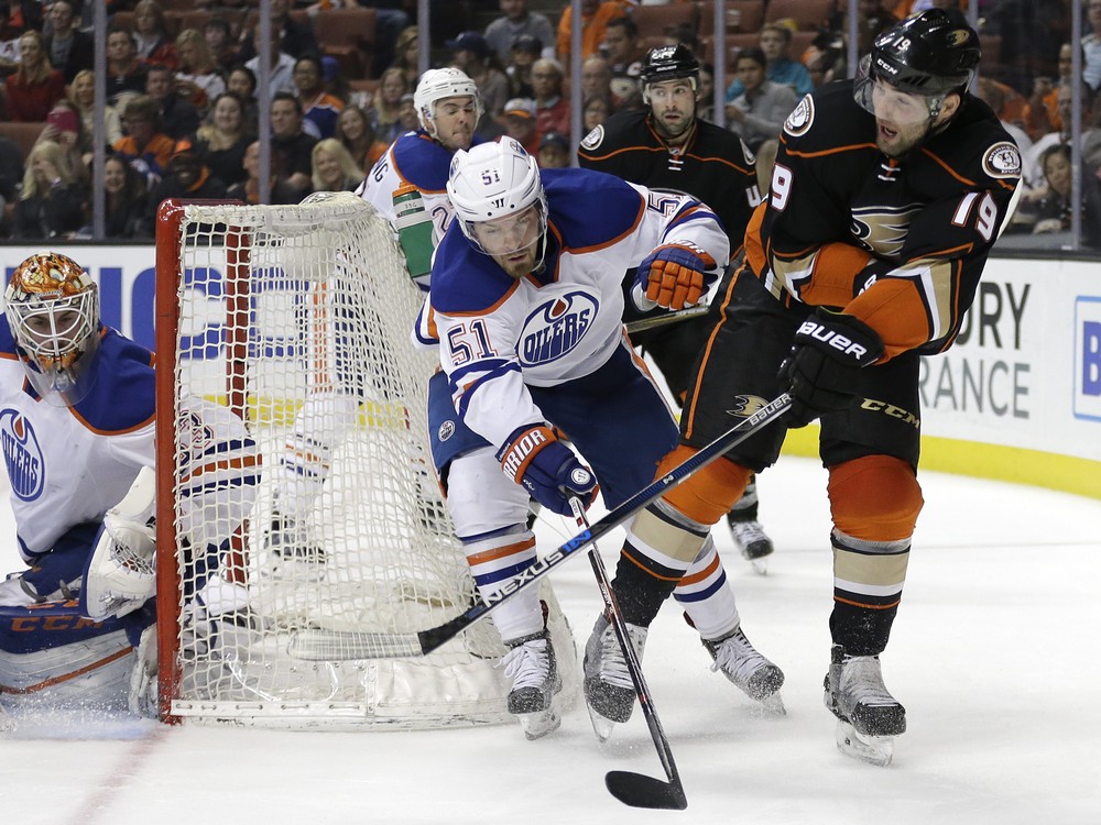 Edmonton Oilers&#039 Anton Lander center of Sweden defends Anaheim Ducks&#039 Patrick Maroon right during the second period of an NHL hockey game Friday Feb. 26 2016 in Anaheim Calif