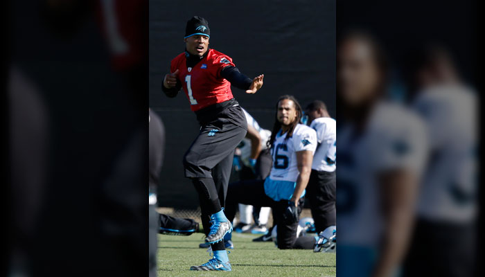 Carolina Panthers quarterback Cam Newton jokes with teammates during practice in preparation for the Super Bowl 50 football game Friday Feb. 5 2016 in San Jose Calif