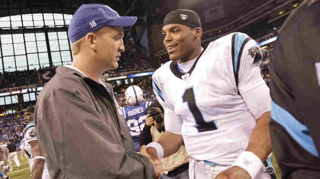 Indianapolis Colts quarterback Peyton Manning meets with Carolina Panthers quarterback Cam Newton after an NFL football game in Indianapolis in 2011. Manning and Newton will square off in the 50th Super Bowl in Santa Clara Calif. on Sunday. The two quar