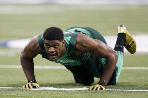 FILE- Defensive lineman Randy Gregory of Nebraska competes during the 2015 NFL Scouting Combine at Lucas Oil Stadium