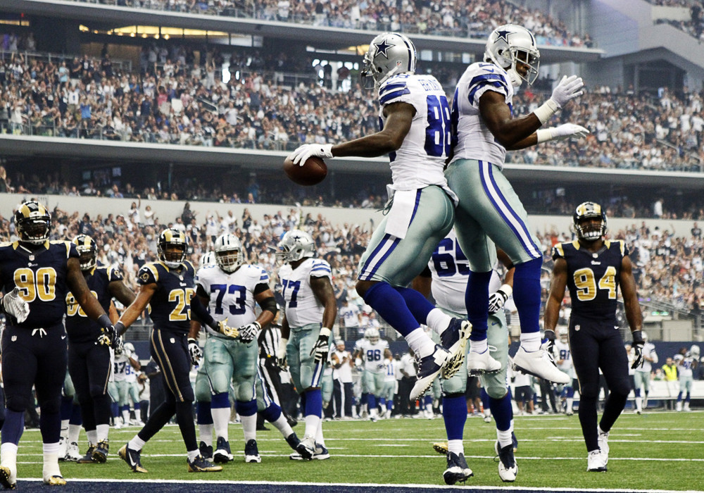 22 SEPTEMBER 2013 Dallas Cowboys wide receiver Dez Bryant body bumps Dallas Cowboys running back De Marco Murray after TD catch during a regular season NFL football game between the St. Louis Rams and Dallas Cowboys at AT&T Stadium in Arlington