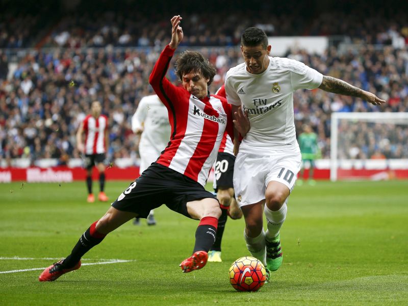 Real Madrid's James Rodriguez and Athletic Bilbao's Ander Iturraspe in action at the Spanish Liga match. – Reuters pic