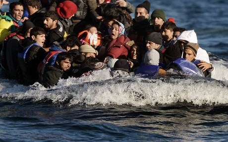 Refugees and migrants arrive on the Greek Lesbos island after crossing the Aegean Sea from Turkey. AFP