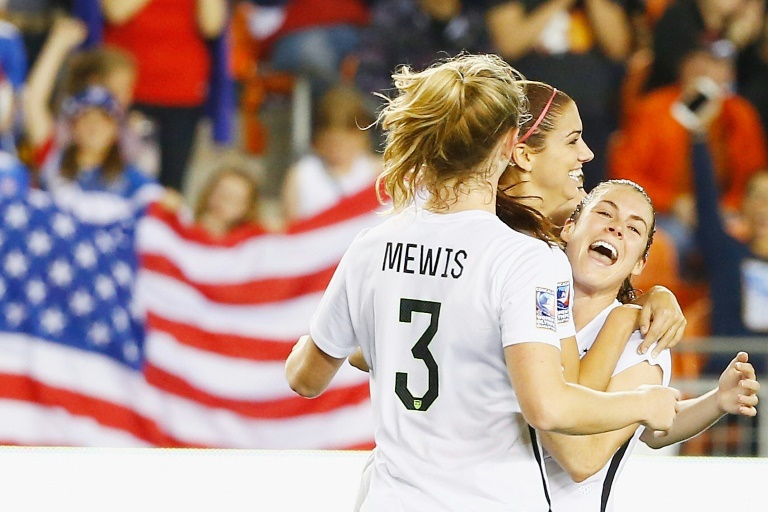 Getty  AFP  Scott Halleran Alex Morgan of the US celebrates with teammates after scoring a goal during their CONCACAF Women's Olympic Qualifying semi-final against Trinidad and Tobago at BBVA Compass Stadium in Houston Texas